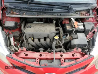 2012 Toyota Yaris L with VIN JTDKTUD32CD517695, listed as a Copart auction lot 57392355 with 201,711 mi miles and Salvage title. Bid and sale history available at DreamBid. Image 11.