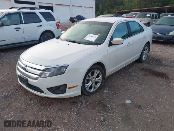 2012 Ford Fusion SE z VIN 3FAHP0HG3CR445925, wystawiony jako IAAI lot #42664342 z przebiegiem 194 798 mil mil oraz . Historia ofert i sprzedaży dostępna na DreamBid. Obrazek 2.