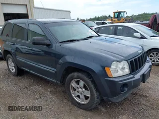 2007 Jeep Grand Cherokee Laredo z VIN 1J8GR48K97C664834, wystawiony jako IAAI lot #42361977 z przebiegiem 237 511 mil mil oraz . Historia ofert i sprzedaży dostępna na DreamBid. Obrazek 1.