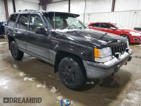 1995 Jeep Grand Cherokee Laredo with VIN 1J4GZ58Y5SC565187, listed as a Copart auction lot 45179985 with 122,863 mi miles and Salvage Title. Bid and sale history available at carsss.com. Image 4.
