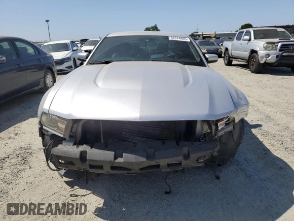2012 Ford Mustang Premium z VIN 1ZVBP8AM7C5237576, wystawiony jako Copart lot #60374995 z przebiegiem 123 061 mil mil oraz Szkoda całkowita • Salvage title. Historia ofert i sprzedaży dostępna na DreamBid. Obrazek 5.