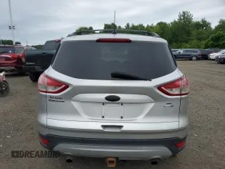 2013 Ford Escape SE z VIN 1FMCU9G9XDUC40645, wystawiony jako Copart lot #62681275 z przebiegiem 117 744 mil mil oraz Czysty tytuł • Clean title. Historia ofert i sprzedaży dostępna na DreamBid. Obrazek 6.