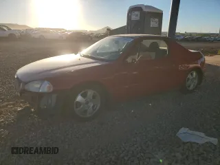 1993 Honda del Sol Si with VIN JHMEH626XPS004119, listed as a Copart auction lot 77598064 with 157,211 mi miles and Salvage Title. Bid and sale history available at carsss.com. Image 1.