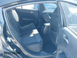 2015 Dodge Charger SXT with VIN 2C3CDXHG5FH841090, listed as a IAAI auction lot 41293591 with 107,732 mi miles and . Bid and sale history available at DreamBid. Image 8.
