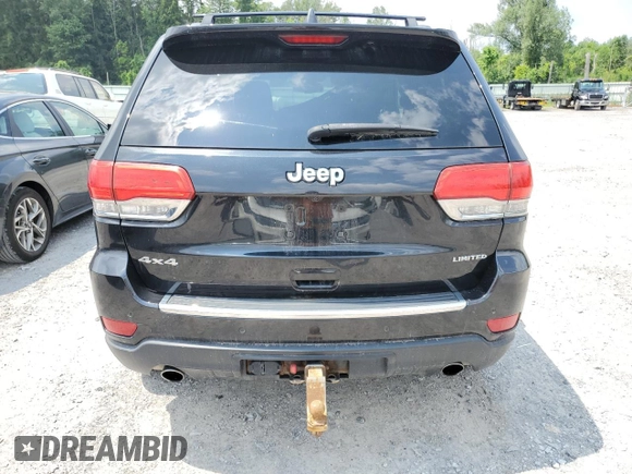 2014 Jeep Grand Cherokee Limited с VIN 1C4RJFBG3EC440429, выставлен на аукционе Copart как лот 63549245 с пробегом 162 178 миль миль и Списание • Salvage title. История ставок и продаж доступна на DreamBid. Изображение 6.