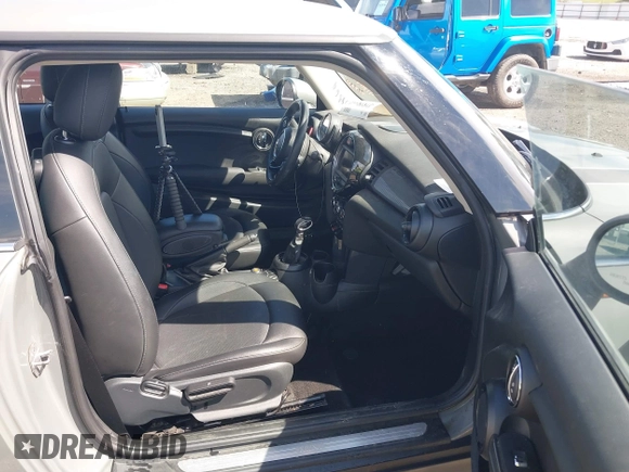 2019 MINI Hardtop Cooper with VIN WMWXP5C55K2H29830, listed as a IAAI auction lot 41808669 with 60,588 mi miles and . Bid and sale history available at DreamBid. Image 5.