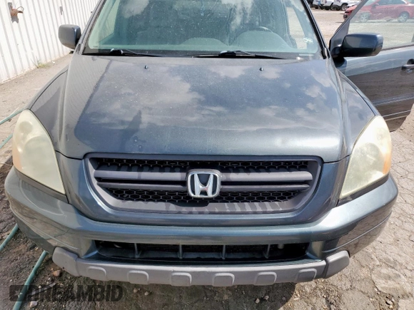 2003 Honda Pilot EX z VIN 2HKYF18583H593038, wystawiony jako Copart lot #59750725 z przebiegiem 249 921 mil mil oraz Czysty tytuł • Clean title. Historia ofert i sprzedaży dostępna na DreamBid. Obrazek 12.