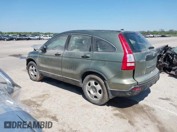 2009 Honda CR-V LX with VIN 5J6RE48399L029677, listed as a IAAI auction lot 38701558 with 136,294 mi miles. Bid and sale history available at carsss.com. Image 3.