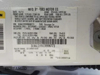 2014 Lincoln MKZ with VIN 3LN6L2J9XER808773, listed as a IAAI auction lot 42112712 with 105,832 mi miles. Bid and sale history available at carsss.com. Image 9.