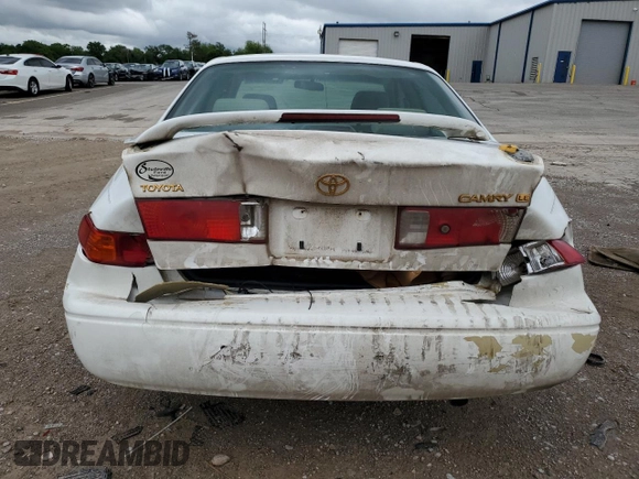 2001 Toyota Camry CE z VIN JT2BG22KX10564294, wystawiony jako Copart lot #53317505 z przebiegiem 227 358 mil mil oraz Szkoda całkowita • Salvage title. Historia ofert i sprzedaży dostępna na DreamBid. Obrazek 6.