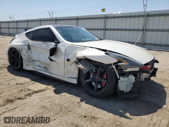 2015 Nissan 370Z Nismo z VIN JN1AZ4EH3FM441254, wystawiony jako Copart lot #52646145 z przebiegiem 74 303 mil mil oraz Szkoda całkowita • Salvage title. Historia ofert i sprzedaży dostępna na DreamBid. Obrazek 4.