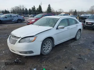 2014 Chrysler 200 Limited with VIN 1C3CCBCG2EN186518, listed as a IAAI auction lot 41521448 with 63,527 mi miles and . Bid and sale history available at DreamBid. Image 2.