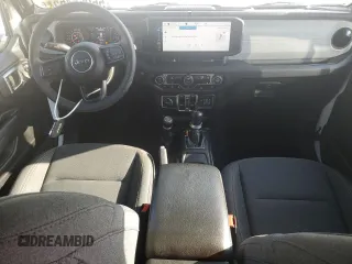 2024 Jeep Wrangler Sport S with VIN 1C4PJXDN6RW297070, listed as a Copart auction lot 56965465 with 21,872 mi miles and Salvage title. Bid and sale history available at DreamBid. Image 8.