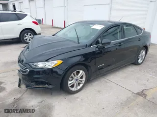2018 Ford Fusion Hybrid SE with VIN 3FA6P0LU9JR286359, listed as a IAAI auction lot 41973064 with 145,267 mi miles. Bid and sale history available at carsss.com. Image 2.