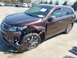 2014 Kia Sorento SX with VIN 5XYKW4A73EG458059, listed as a IAAI auction lot 41860159 with 140,644 mi miles. Bid and sale history available at carsss.com. Image 2.