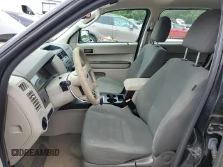 2012 Ford Escape XLS with VIN 1FMCU9C71CKA30319, listed as a Copart auction lot 60189745 with 214,736 mi miles and Salvage title. Bid and sale history available at DreamBid. Image 7.