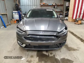 2017 Ford Fusion Hybrid SE z VIN 3FA6P0LU4HR226127, wystawiony jako Copart lot #50496455 z przebiegiem 98 027 mil mil oraz Szkoda całkowita • Salvage title. Historia ofert i sprzedaży dostępna na DreamBid. Obrazek 5.