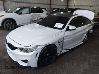 2015 BMW M4 z VIN WBS3R9C59FK331843, wystawiony jako IAAI lot #42105398 z przebiegiem 105 348 mil mil oraz . Historia ofert i sprzedaży dostępna na DreamBid. Obrazek 2.