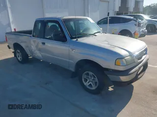 2003 Mazda B-Series Truck SE z VIN 4F4YR46V43TM07638, wystawiony jako IAAI lot #42055482 z przebiegiem 324 461 mil mil oraz . Historia ofert i sprzedaży dostępna na DreamBid. Obrazek 1.