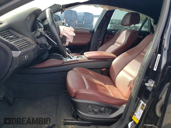 2011 BMW X6 50i with VIN 5UXFG8C52BLZ95196, listed as a Copart auction lot 79100194 with 0 mi miles and Salvage Title. Bid and sale history available at carsss.com. Image 7.