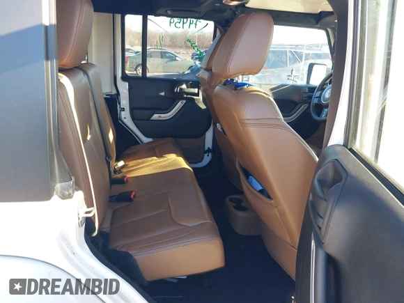 2013 Jeep Wrangler Unlimited Sahara with VIN 1C4BJWEG3DL658530, listed as a IAAI auction lot 41421006 with 115,321 mi miles and . Bid and sale history available at DreamBid. Image 8.
