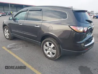 2015 Chevrolet Traverse LTZ with VIN 1GNKVJKDXFJ206159, listed as a IAAI auction lot 41762515 with 143,062 mi miles and . Bid and sale history available at DreamBid. Image 3.