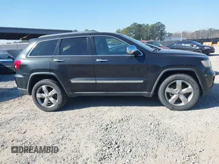 2013 Jeep Grand Cherokee Overland with VIN 1C4RJECG7DC644822, listed as a IAAI auction lot 41658872 with 156,838 mi miles. Bid and sale history available at carsss.com. Image 13.
