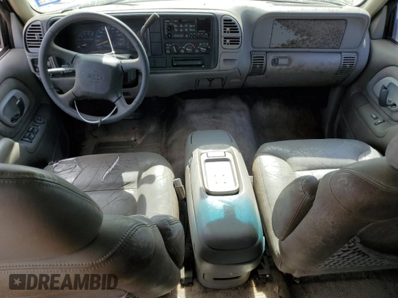 1999 Chevrolet Suburban with VIN 3GNEC16R7XG141671, listed as a Copart auction lot 77784174 with 207,234 mi miles and Salvage Title. Bid and sale history available at carsss.com. Image 8.