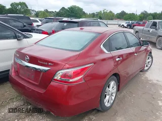 2015 Nissan Altima SV with VIN 1N4AL3AP1FC486873, listed as a IAAI auction lot 42032286 with 116,618 mi miles and . Bid and sale history available at carsss.com. Image 4.