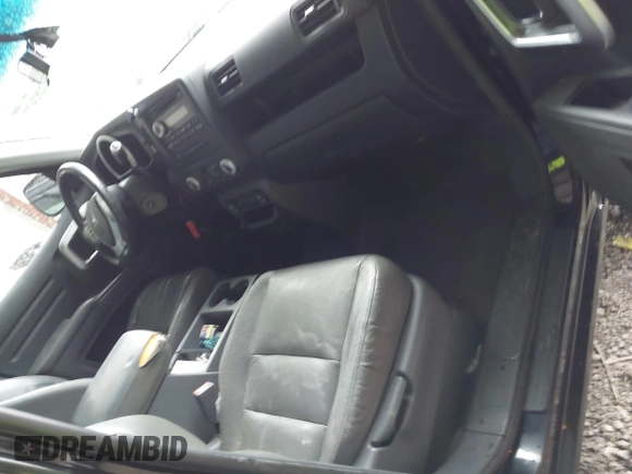 2007 Honda Ridgeline RTL with VIN 2HJYK16547H549241, listed as a IAAI auction lot 42282477 with 214,685 mi miles and . Bid and sale history available at DreamBid. Image 5.