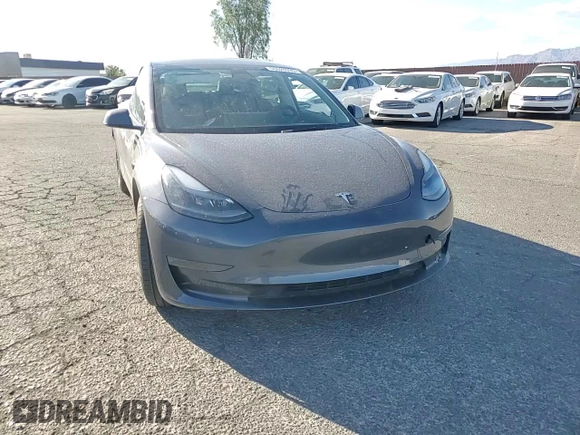 2023 Tesla Model 3 with VIN 5YJ3E1EA4PF556782, listed as a Copart auction lot 55626935 with 26,615 mi miles and Salvage title. Bid and sale history available at DreamBid. Image 14.