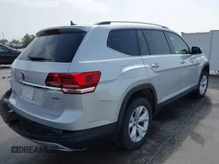2018 Volkswagen Atlas SE with VIN 1V2KR2CA7JC546436, listed as a IAAI auction lot 41739327 with 123,916 mi miles and . Bid and sale history available at DreamBid. Image 4.