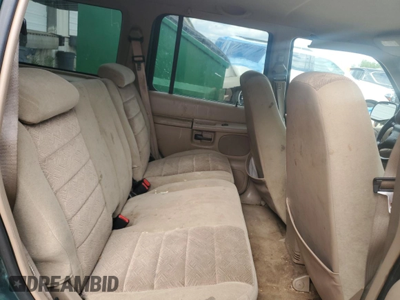 2000 Ford Explorer XLT с VIN 1FMZU73E2YZB13205, выставлен на аукционе Copart как лот 57918165 с пробегом 203 635 миль миль и Чистый • Clean title. История ставок и продаж доступна на DreamBid. Изображение 11.