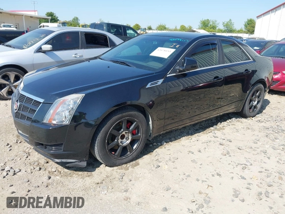 2009 Cadillac CTS RWD w/1SA with VIN 1G6DF577390128796, listed as a IAAI auction lot 42078153 with 257,757 mi miles. Bid and sale history available at carsss.com. Image 2.