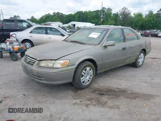 2001 Toyota Camry CE with VIN 4T1BG28K11U040227, listed as a IAAI auction lot 42220307 with 212,125 mi miles and . Bid and sale history available at DreamBid. Image 2.