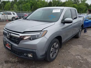 2018 Honda Ridgeline RTL with VIN 5FPYK3F52JB002649, listed as a IAAI auction lot 42338360 with 68,802 mi miles and . Bid and sale history available at DreamBid. Image 17.