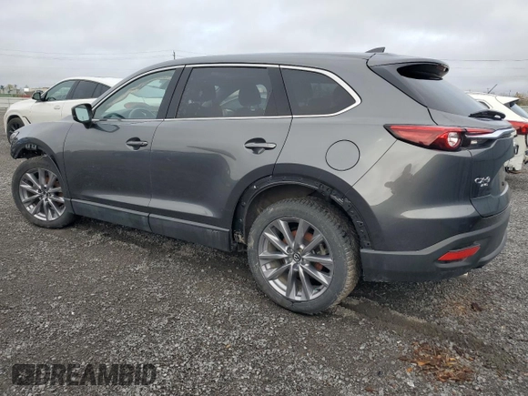 2023 Mazda CX-9 Touring with VIN JM3TCBCY4P0654597, listed as a Copart auction lot 55920855 with 58,534 mi miles and Salvage title. Bid and sale history available at DreamBid. Image 2.