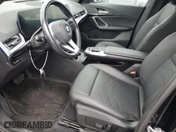 2023 BMW X1 xDrive28i with VIN WBX73EF09P5W64467, listed as a Copart auction lot 58586875 with 29,022 mi miles and Salvage title. Bid and sale history available at DreamBid. Image 7.