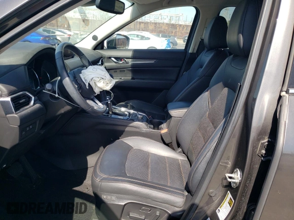 2019 Mazda CX-5 Grand Touring with VIN JM3KFADM6K1641992, listed as a Copart auction lot 57862345 with 37,100 mi miles and Salvage title. Bid and sale history available at DreamBid. Image 7.