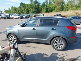 2015 Kia Sportage LX with VIN KNDPBCAC2F7764189, listed as a IAAI auction lot 42144059 with 181,247 mi miles and . Bid and sale history available at carsss.com. Image 14.