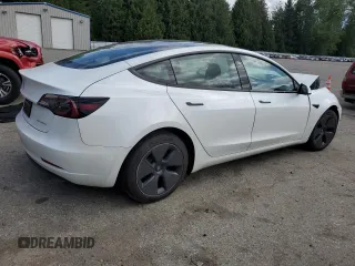 2023 Tesla Model 3 Long Range with VIN 5YJ3E1EB1PF603100, listed as a Copart auction lot 54945865 with 22,865 mi miles and Salvage Title. Bid and sale history available at DreamBid. Image 3.