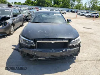 2014 BMW 2 Series 228i with VIN WBA1F5C58EV256093, listed as a Copart auction lot 57579434 with 74,596 mi miles and Salvage Title. Bid and sale history available at carsss.com. Image 5.