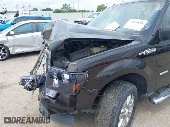 2014 Ford F-150 XL with VIN 1FTFW1CT7EKE28227, listed as a IAAI auction lot 42129699 with 85,149 mi miles and . Bid and sale history available at DreamBid. Image 6.