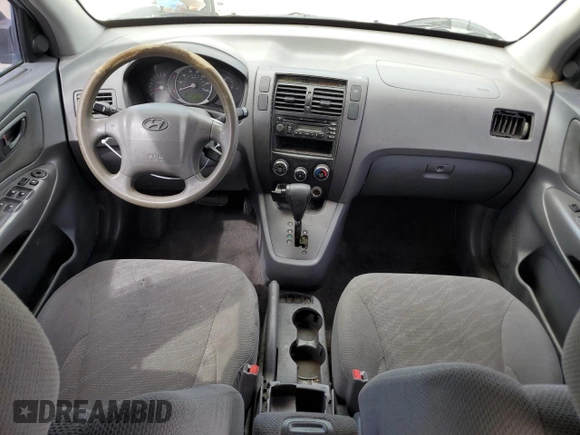 2005 Hyundai Tucson GL with VIN KM8JM12B95U080391, listed as a Copart auction lot 72551384 with 238,122 mi miles and Salvage Title. Bid and sale history available at carsss.com. Image 8.
