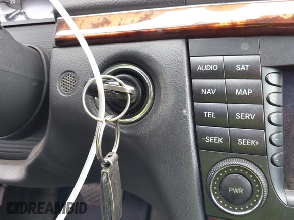 2005 Mercedes-Benz E-Class 3.2L with VIN WDBUF65J45A658795, listed as a IAAI auction lot 41923148 with 106,832 mi miles. Bid and sale history available at carsss.com. Image 11.