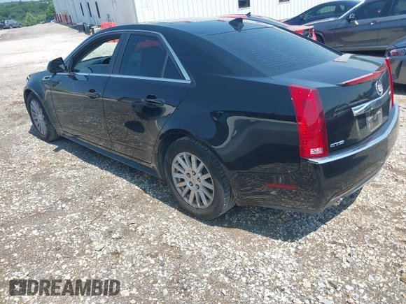2013 Cadillac CTS Luxury with VIN 1G6DE5E55D0118722, listed as a IAAI auction lot 42448616 with 131,906 mi miles and . Bid and sale history available at DreamBid. Image 3.