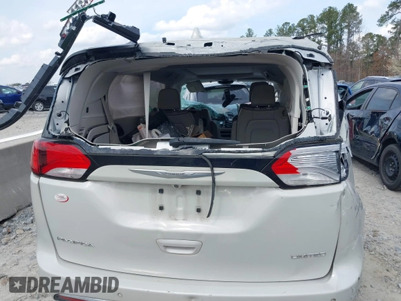 2017 Chrysler Pacifica Limited with VIN 2C4RC1GG9HR560544, listed as a IAAI auction lot 41807810 with 137,768 mi miles and . Bid and sale history available at DreamBid. Image 16.