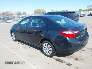 2015 Toyota Corolla L z VIN 2T1BURHE3FC271909, wystawiony jako IAAI lot #41898712 z przebiegiem 142 987 mil mil oraz . Historia ofert i sprzedaży dostępna na DreamBid. Obrazek 14.