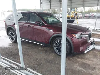 2024 Mazda CX-90 Premium Plus z VIN JM3KKEHA9R1147896, wystawiony jako IAAI lot #42026467 z przebiegiem 10 312 mil mil oraz . Historia ofert i sprzedaży dostępna na DreamBid. Obrazek 1.