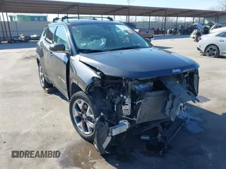 2021 Jeep Compass Limited with VIN 3C4NJDCB5MT596447, listed as a IAAI auction lot 41597395 with 70,203 mi miles and . Bid and sale history available at carsss.com. Image 1.